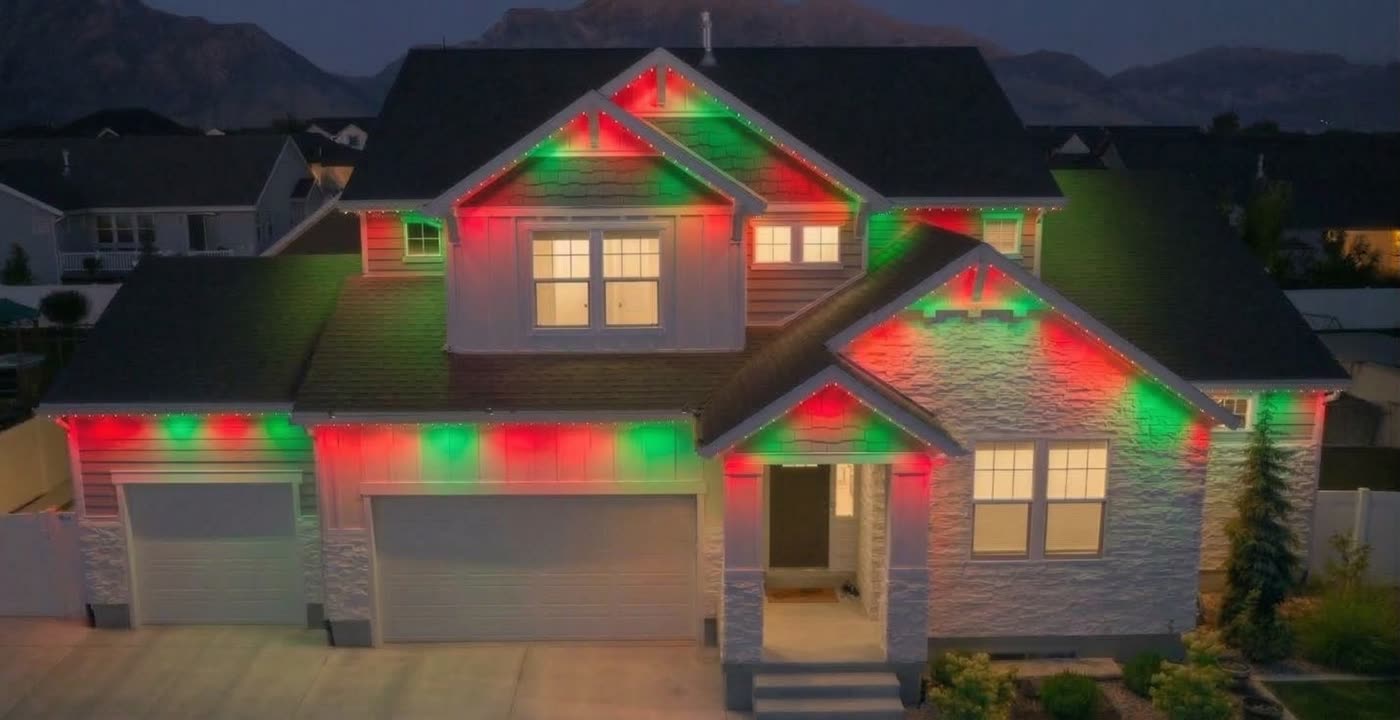 Home in red and green permanent Christmas lights