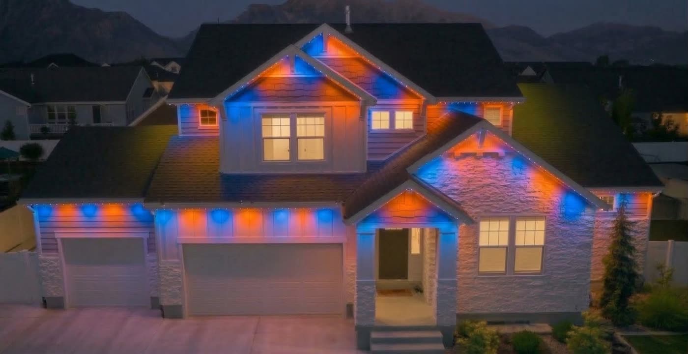 Home in orange and blue game-day lighting
