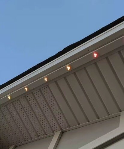 Color-matched Orca track under a white soffit in daylight